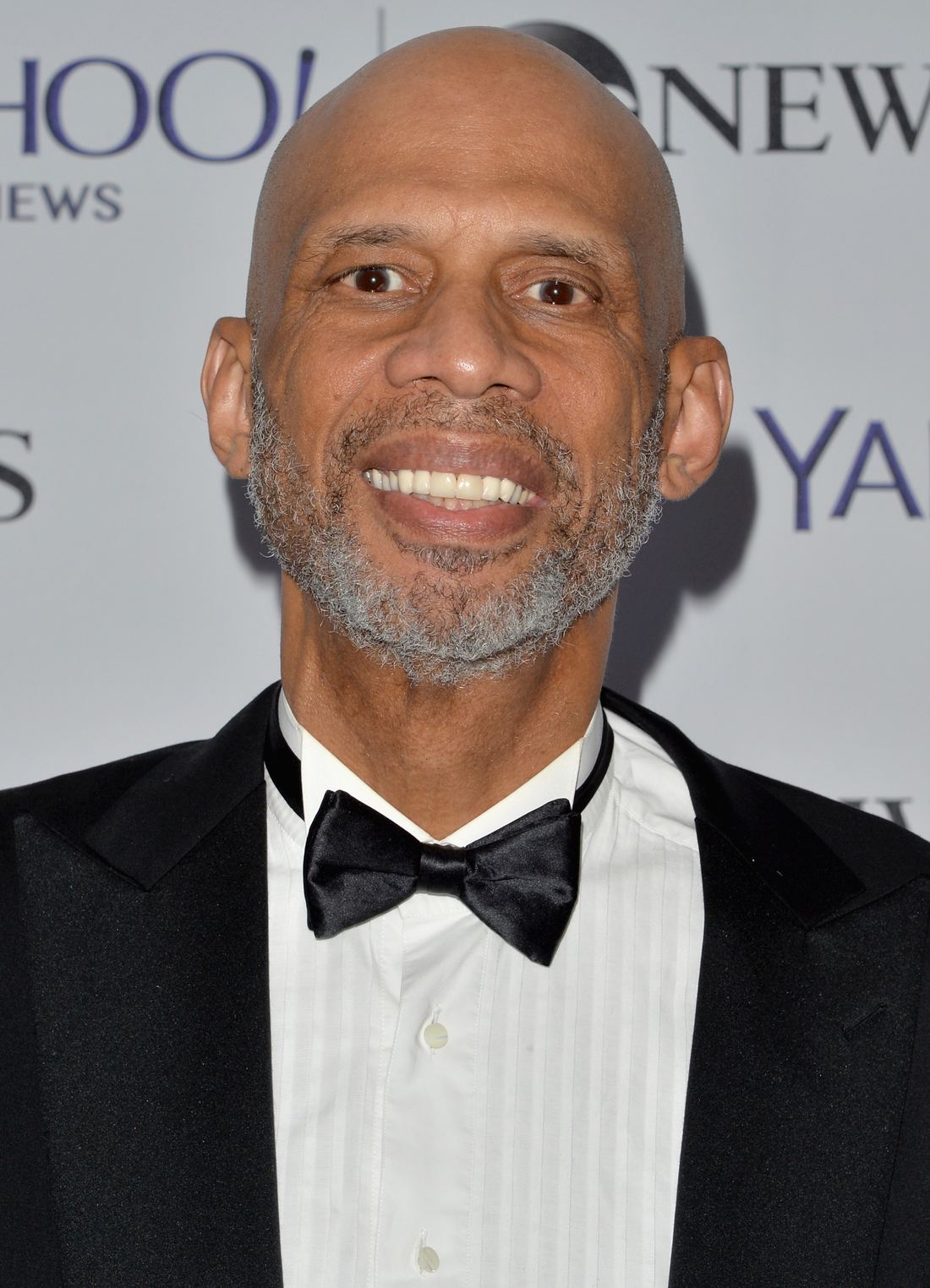 Kareem Abdul-Jabbar smiling at an event in 2014