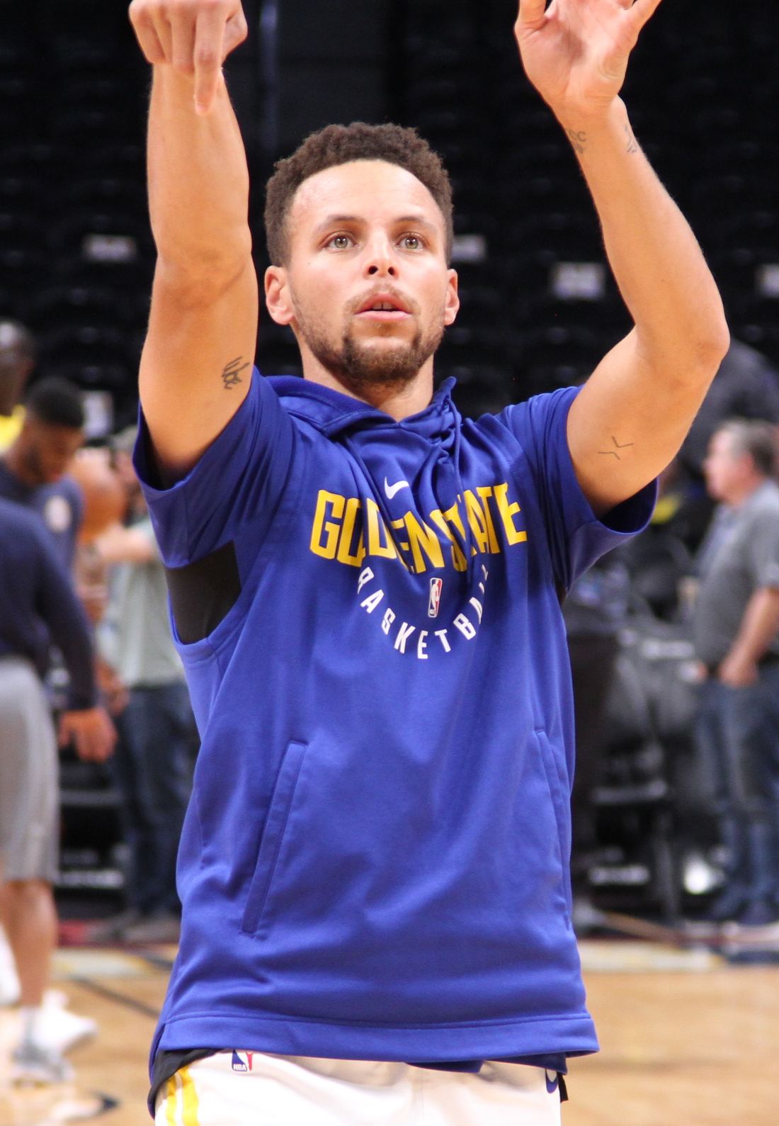 Stephen Curry releasing a jump shot